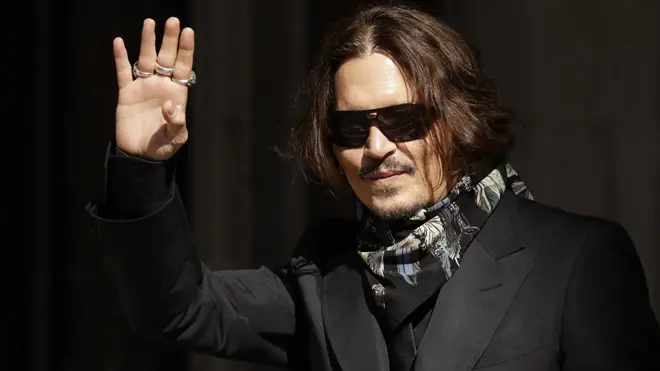 Johnny Depp is suing the Sun's publisher over an article that labelled him a 'wife beater'