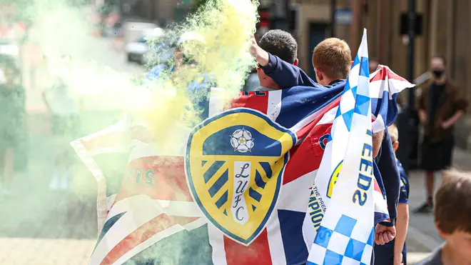 Thousands of Leeds United fans took to the streets to celebrate their team's promotion