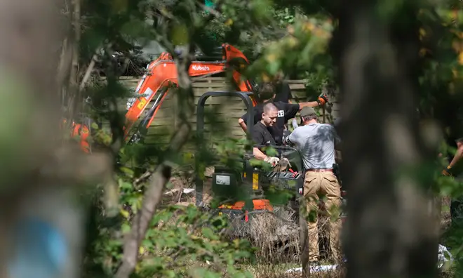 An excavator has been pictured at the scene of the search