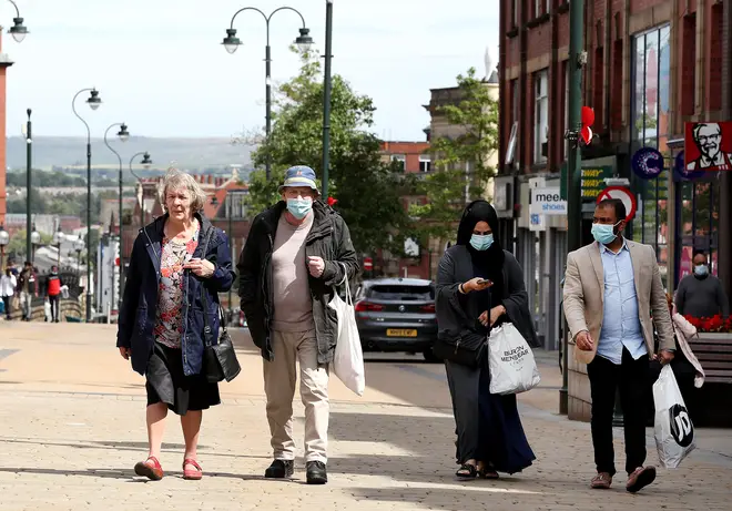 People shopping in Oldham, the town in Greater Manchester has seen cases of coronavirus rise in the area
