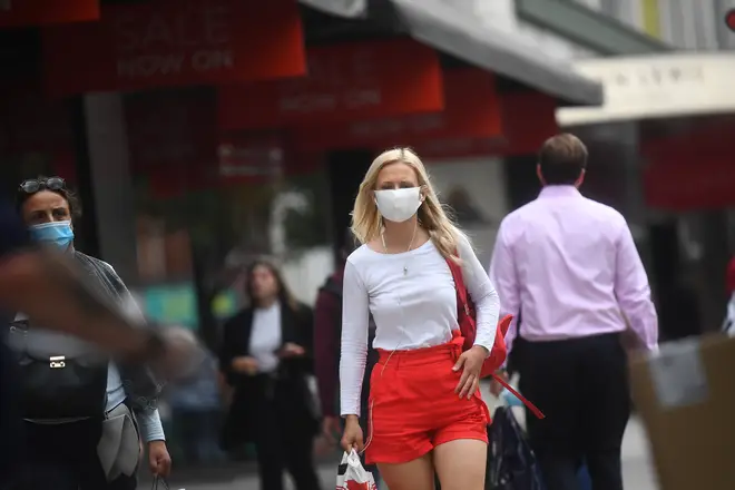 Shoppers on London's Oxford Street in face masks as the Government says it will not hesitate to take action should there be a second Covid spike.