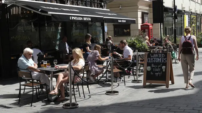 A restaurant in central London on Monday carries the sign 'wanted: customers'