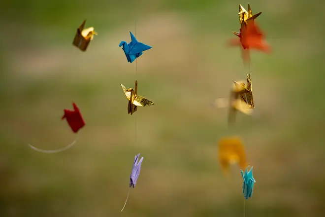 Origami paper cranes can be seen throughout the city.