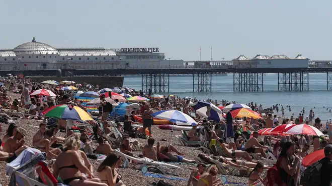 Hundreds of people descended to the coast across Britain on Friday morning as early as 9am