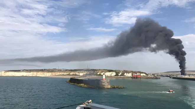 A huge plume of smoke was pictured rising from the industrial unit in Newhaven