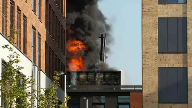 Flames leap from Swansea University's Bay campus after a fire broke out