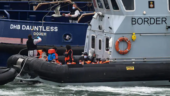 More migrants wearing face masks and orange life-jackets were seen coming into Dover port aboard Border Force vessels on Wednesday