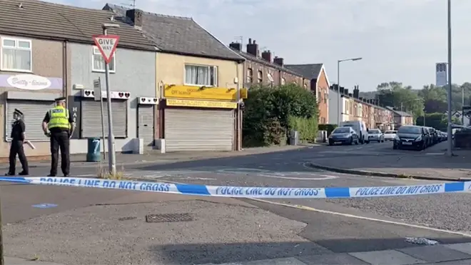 Police at the scene of the shooting in Bury
