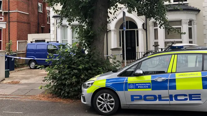 Police outside an address in Cumberland Park, Acton, west London