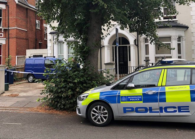 Police outside an address in Cumberland Park, Acton, west London