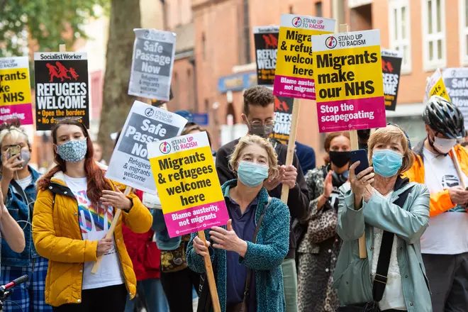 Pro-migrant demonstrators have marched on the Home Office