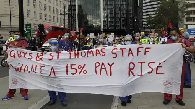 Workers, who have hinted at strike action, made their way to Whitehall on Wednesday