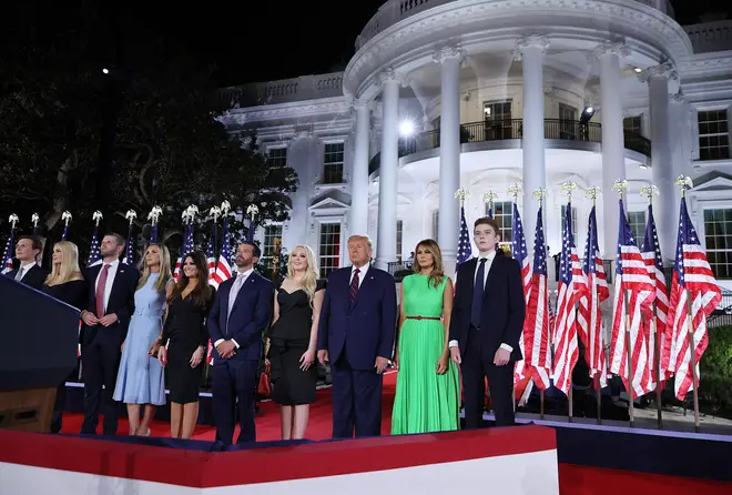 US President Donald Trump (3R) and first lady Melania Trump (2R) stand with their family members following his acceptance speech for the Republican presidential nomination