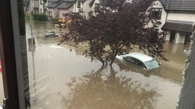 Severe flooding was left cars partially submerged in water