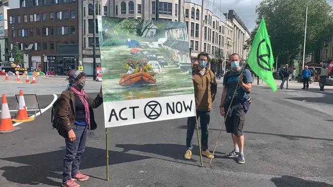 Protesters in Cardiff carried placards calling for action against climate change