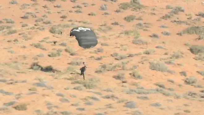 David Blaine touches down safely on the Arizona desert below