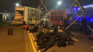 Extinction Rebellion protesters have blockaded a printworks in Liverpool