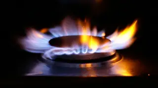 A lit household gas ring