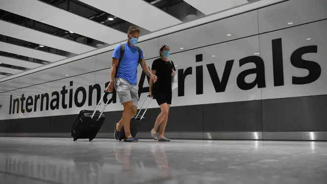 File photo: Passengers wear masks at Heathrow Airport