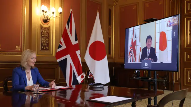 International Trade Secretary Liz Truss speaks to Japan’s minister for foreign affairs Toshimitsu Motegi