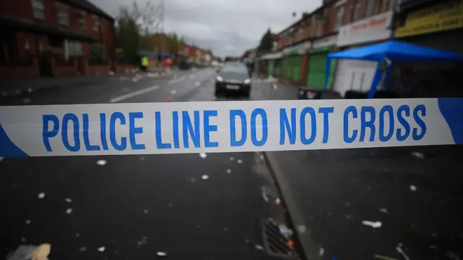 A woman was shot in a street in west London last night