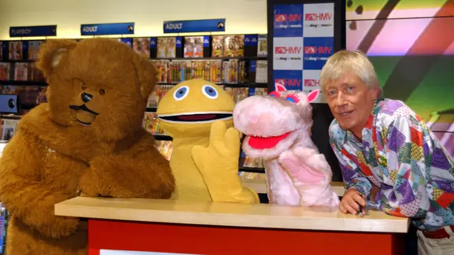 Bungle, Zippy, George, and presenter Geoffrey Hayes on television show Rainbow