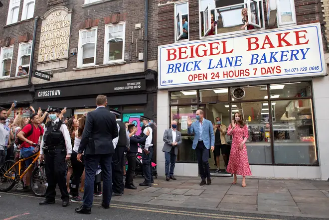 The Duke and Duchess of Cambridge leave after a visit to the Beigel Bake Brick Lane Bakery in London