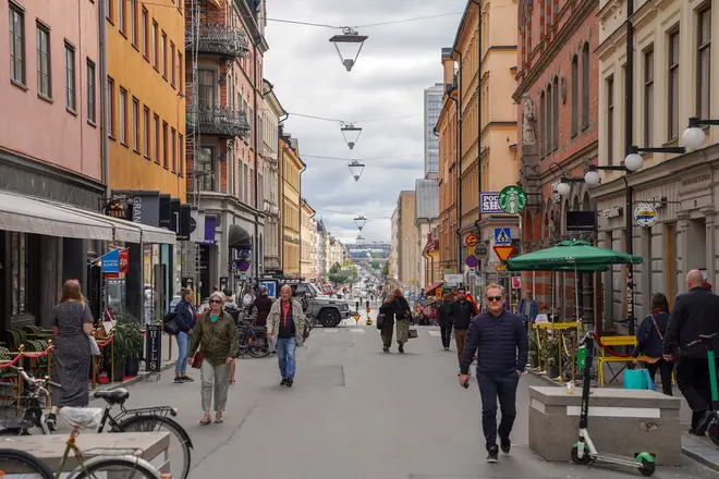 File photo: People walking in a street in Stockholm