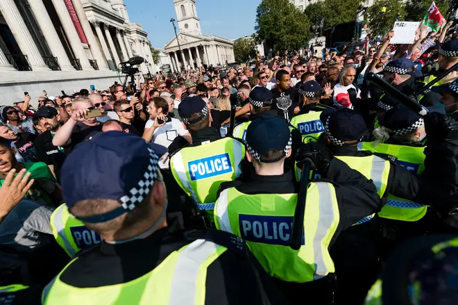 Police made 32 arrests as violent scuffles broke out