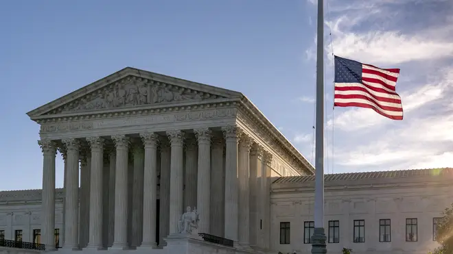 The flag flies at half-mast at the Supreme Court following the death of Justice Ruth Bader Ginsburg (J. Scott Applewhite/AP)