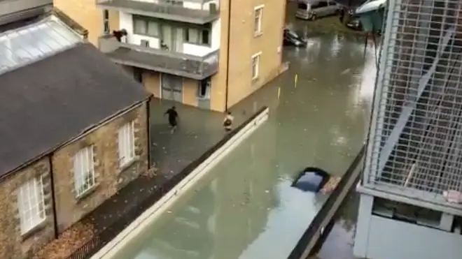 Flood in Hackney leaves cars submerged