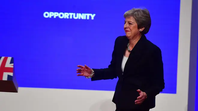 Theresa May dances on to the stage at the Conservative Party Conference