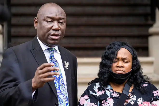 Attorney Ben Crump, left, speaks during a press conference outside City Hall regarding the Breonna Taylor case alongside Tamika Palmer, Breonna Taylor's mother