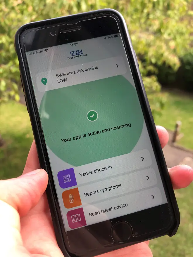The NHS Covid-19 app on a mobile phone. Major questions about the effectiveness of the coronavirus contact tracing app have been left unanswered, a charity has warned on the eve of its launch (Scott D'Arcy/PA)