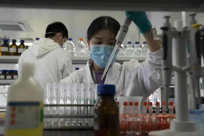 An employee of SinoVac works in a lab at a factory producing its SARS CoV-2 Vaccine for COVID-19
