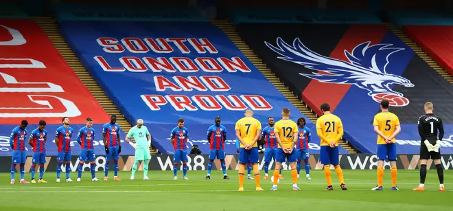 Crystal Palace and Everton players observe a minute's silence to pay their respects to local police officer Sergeant Matt Ratana