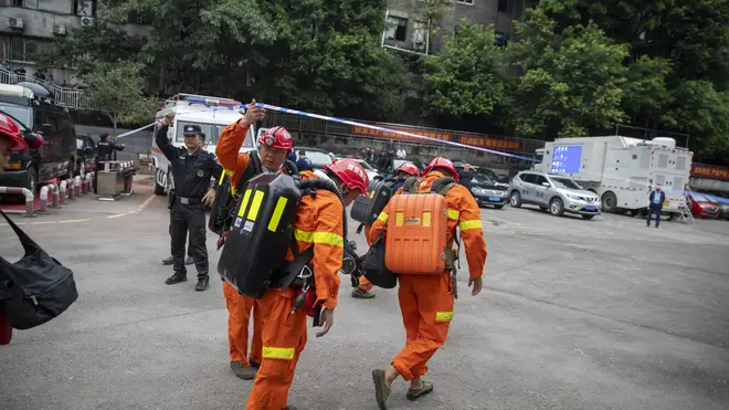 Rescuers arrive at the coal mine in south-west China