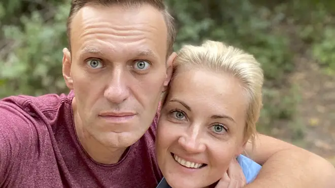 Russian opposition leader Alexei Navalny and his wife Yulia