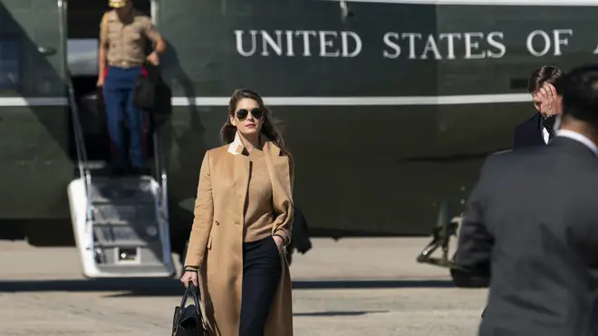 Hope Hicks, seen getting off Marine One on Wednesday, before falling ill
