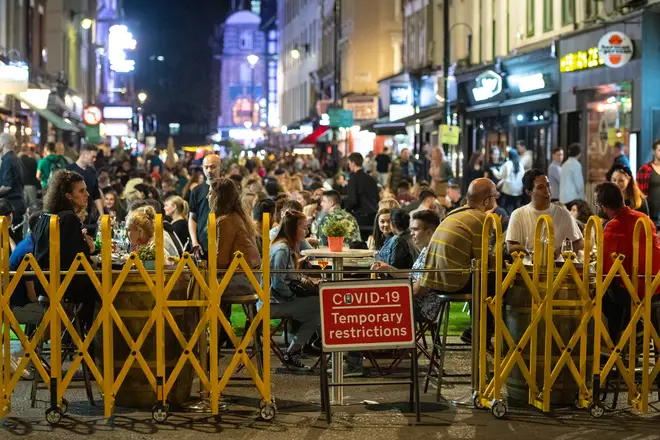 General view of people enjoying a night out in Soho