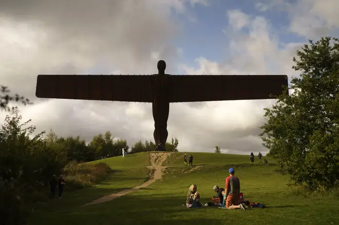 A family enjoy a picnic next to the Angel of the North on September 19, 2020 in Gateshead, United Kingdom.