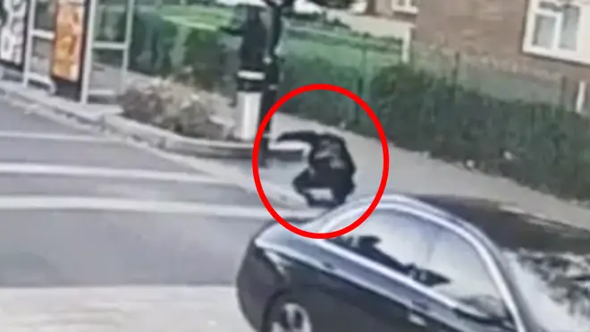 This is the moment the officer was jettisoned from the bonnet of the Mercedes