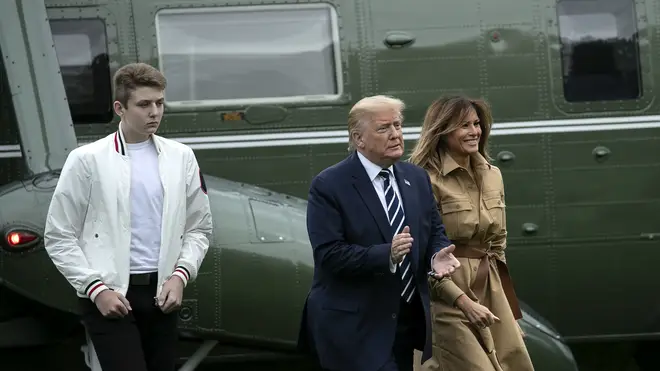 Melania and Donald pictured with 14-year-old Barron