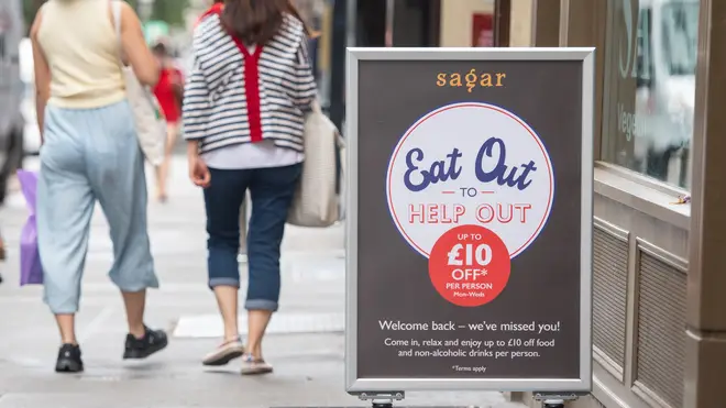 A sign advertising Eat Out to Help Out