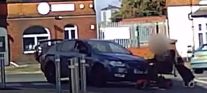 The shocking incident was filmed on dash-cam by a nearby motorist