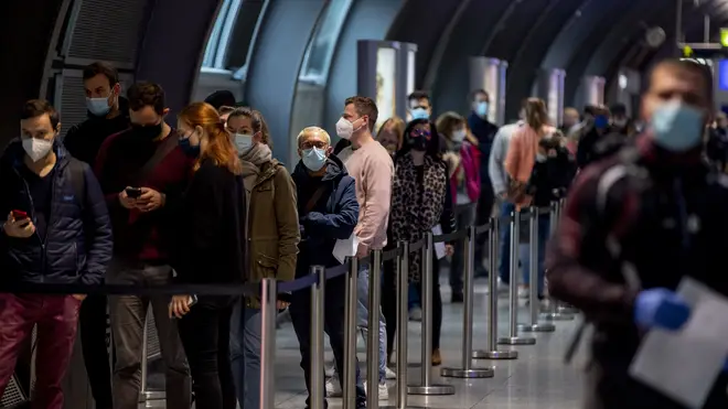 People queue at a Covid-19 test centre in Frankfurt