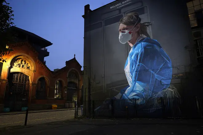 A mural depicting NHS nurse Melanie Senior, based on a photograph by Johannah Churchill.