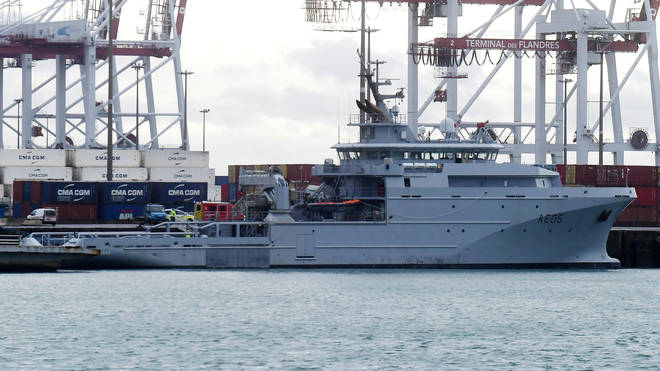 A major search and rescue operation is under way involving military boats and a helicopter