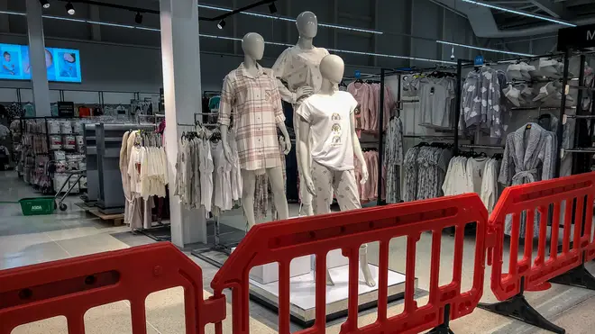 The clothing area in a supermarket near Cardiff is deemed non-essential items and is cordoned off