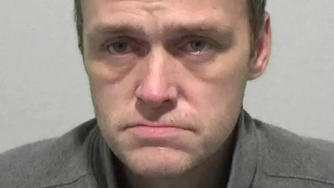 Mark Cooper, 41, was found asleep next to a half-eaten cheesecake